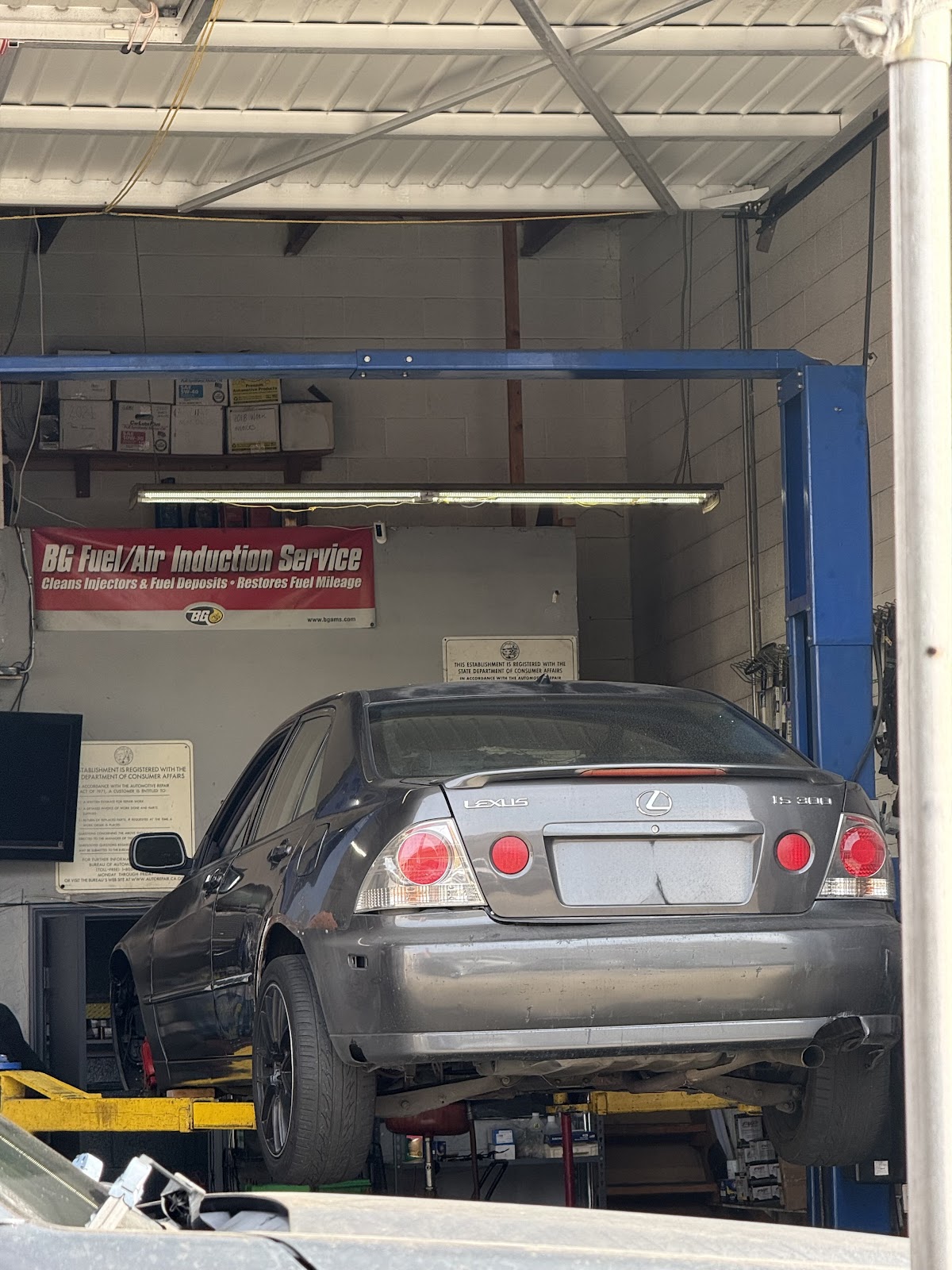 A Lexus on the lift for service